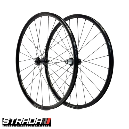 A photo showing a pair of 700c Strada All Road Plus disc bicycle wheels in black with Miche centre-lock hubs.