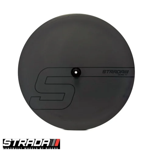 A picture showing a carbon Strada Ultra TT Disc disc Brake rear wheel in a raw carbon finish with a custom Strada S shape logo in Black